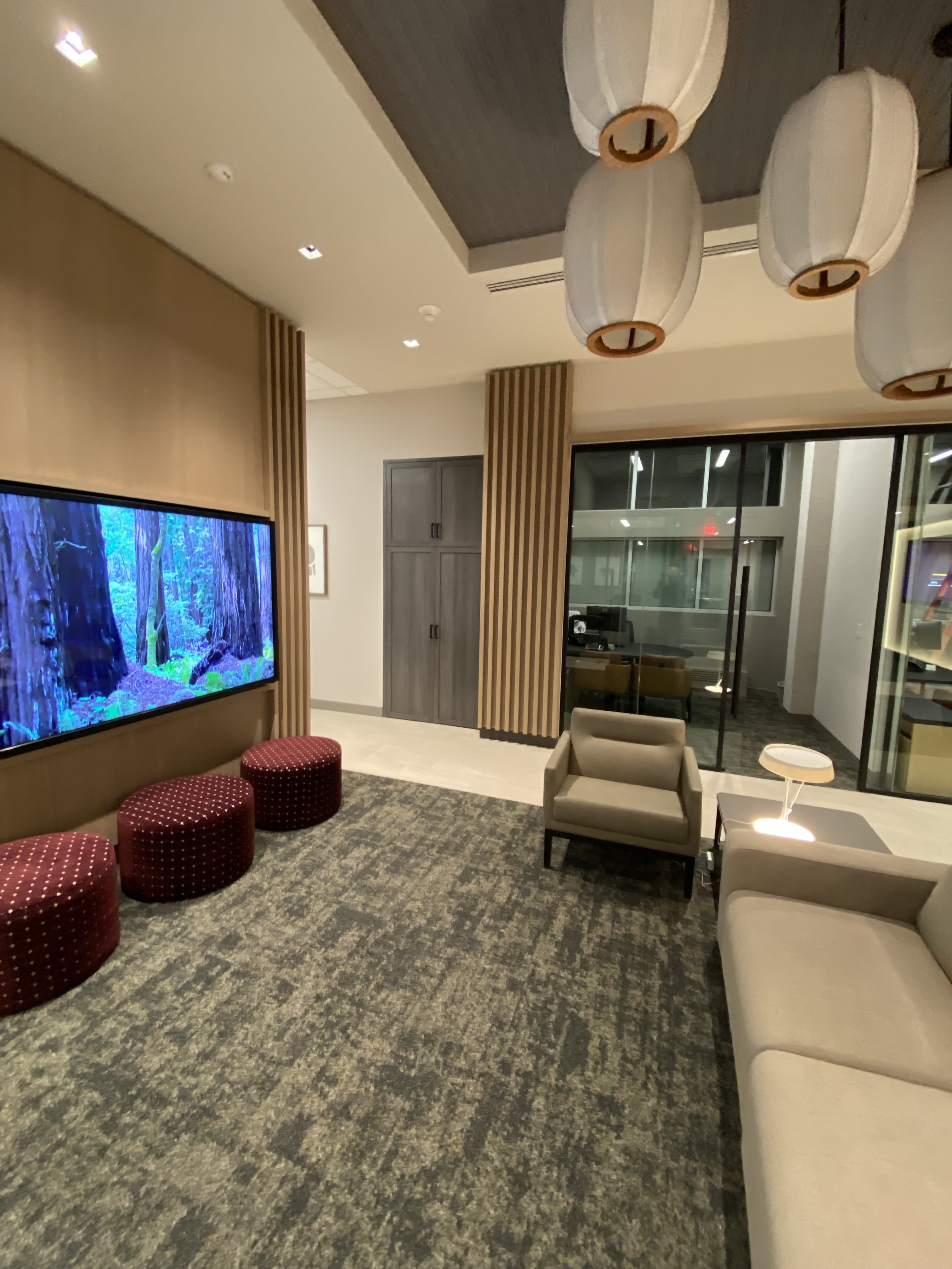Finished commercial reception and lounge interior with custom millwork by Deerfield Interiors, New York City